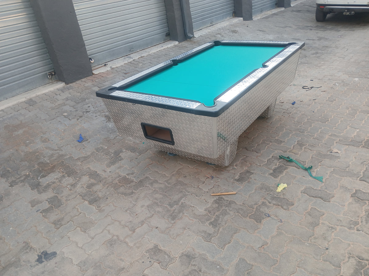 Coin operated pool table