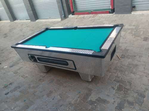 Coin operated pool table