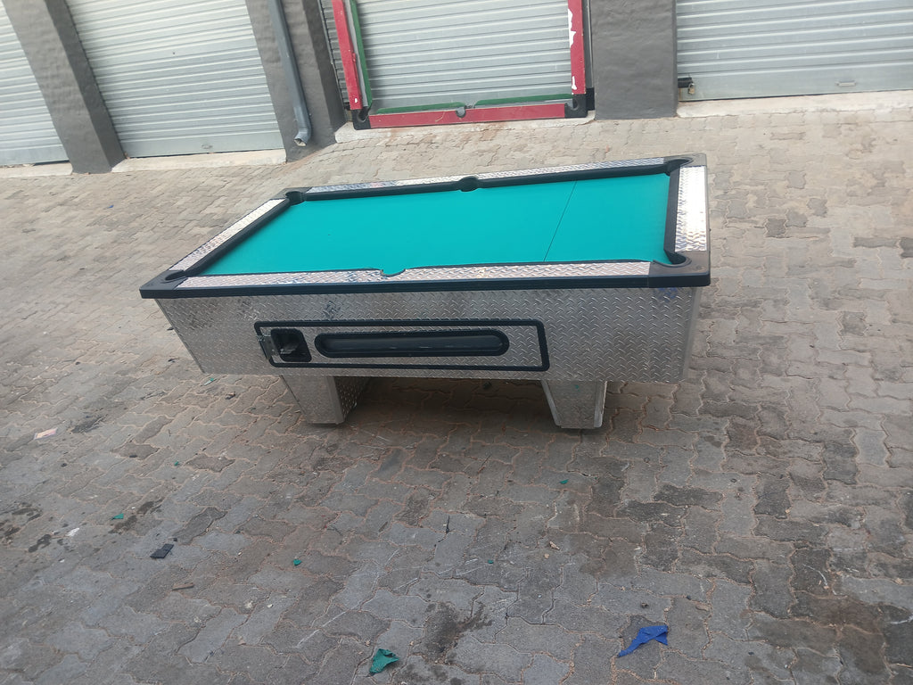 Coin operated pool table