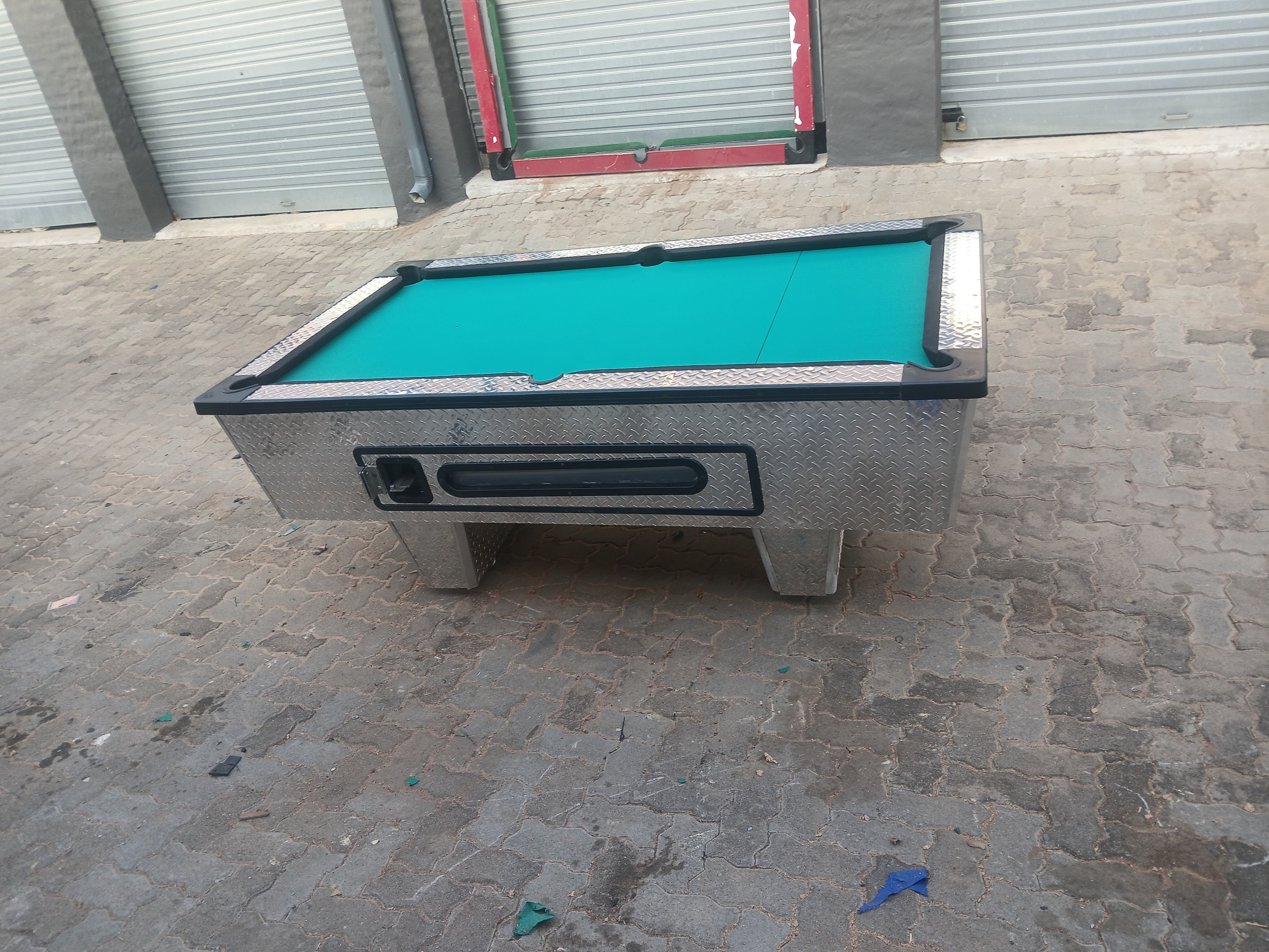 Coin operated pool table