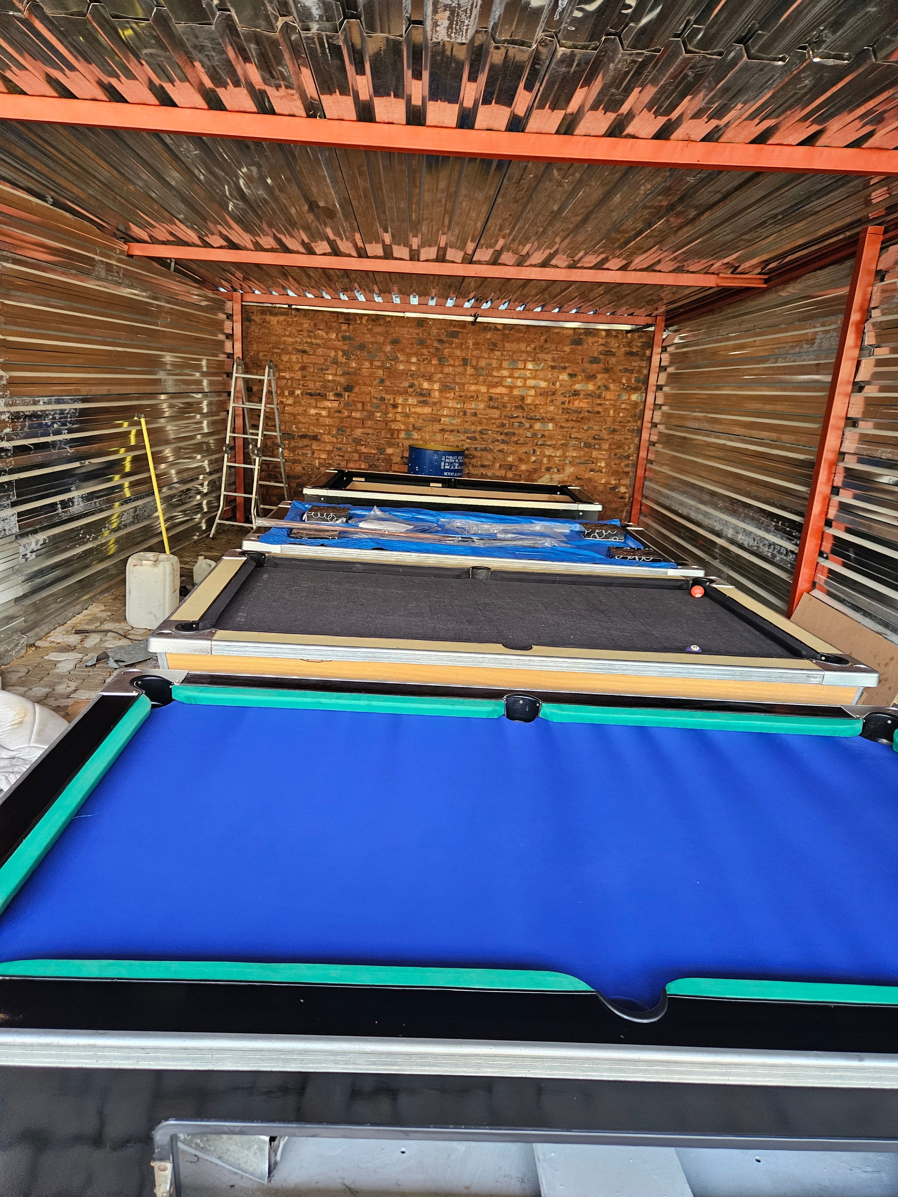 Refurbished coin operated pool table