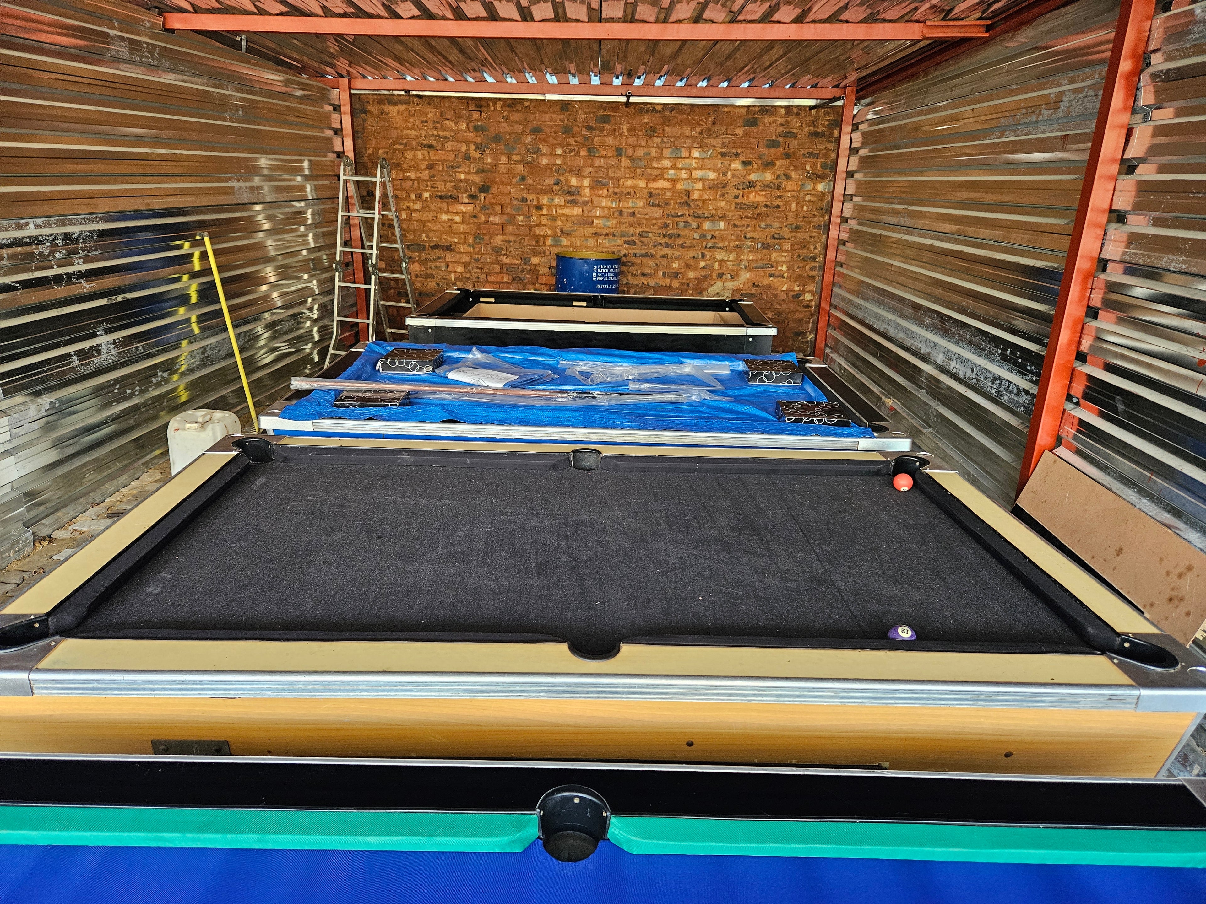 Refurbished coin operated pool table
